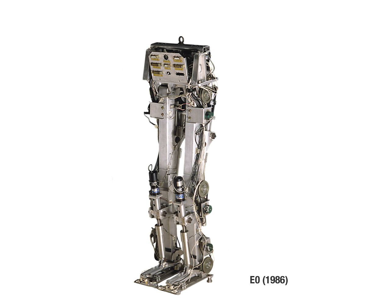 A series of images show iterations Asimo from legs in 1986 to its humanoid form in 2000-present.