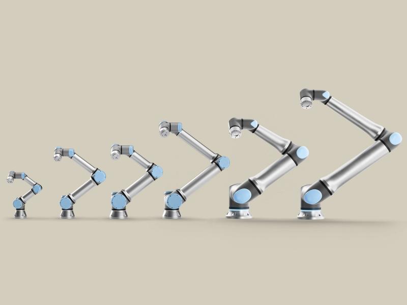 Six versions of progressively larger silver and blue jointed cobot robotic arms by Universal Robots.