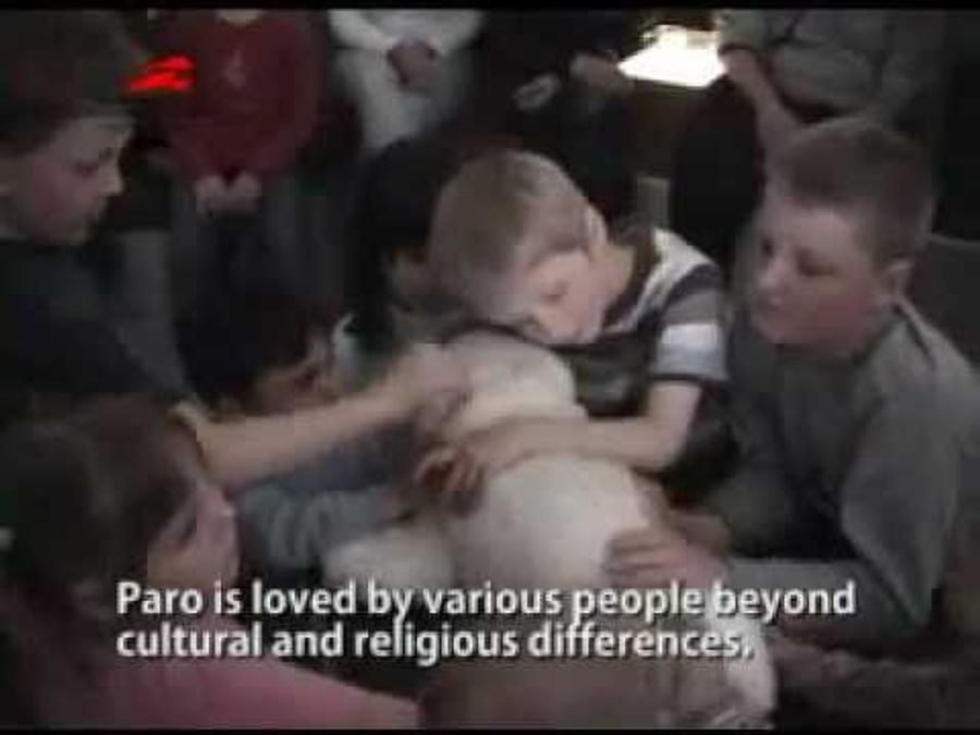 Nursing home residents meet Paro.