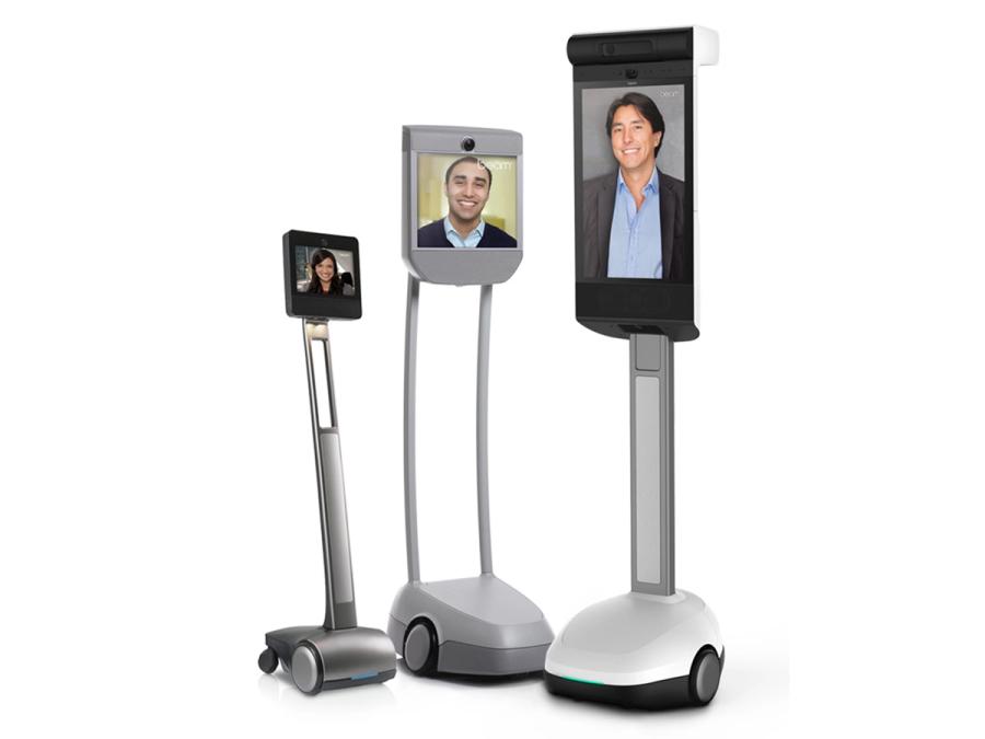 Three telepresence robots of different sizes.