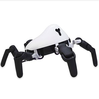 A robot with 6 black legs extending and bending out of a white abdomen.