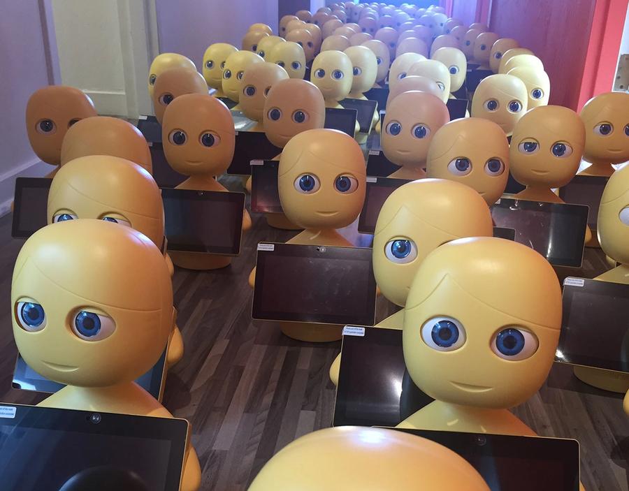 A large group of Mabu robots.